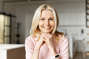 Closeup of woman smiling in office