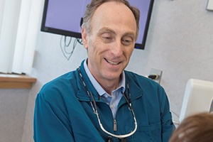 Dr. Sanker talking to patient