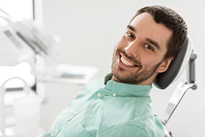 Closeup of man smiling while sitting in treatment chair