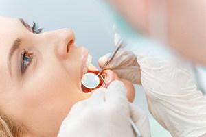 Woman getting a dental crown in Rockville 