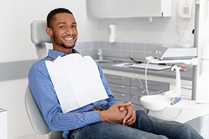 man sitting patiently in the dental chair