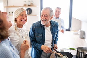 Dentures patient in Rockville talking to friends and family