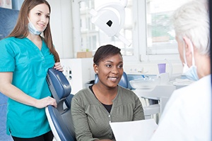 Woman visiting her Rockville implant dentist for a consultation