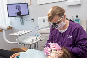 Woman smiling in dental chair