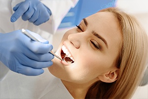 Woman receiving dental checkup