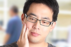 Man holding jaw